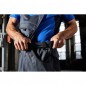 Specialized workwear pants with bib, with functional details and flexibly adjustable elastic waistband